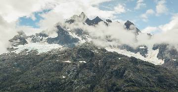 Glaciated peaks above the bay